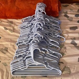 Set of Light Blue Plastic Hangers